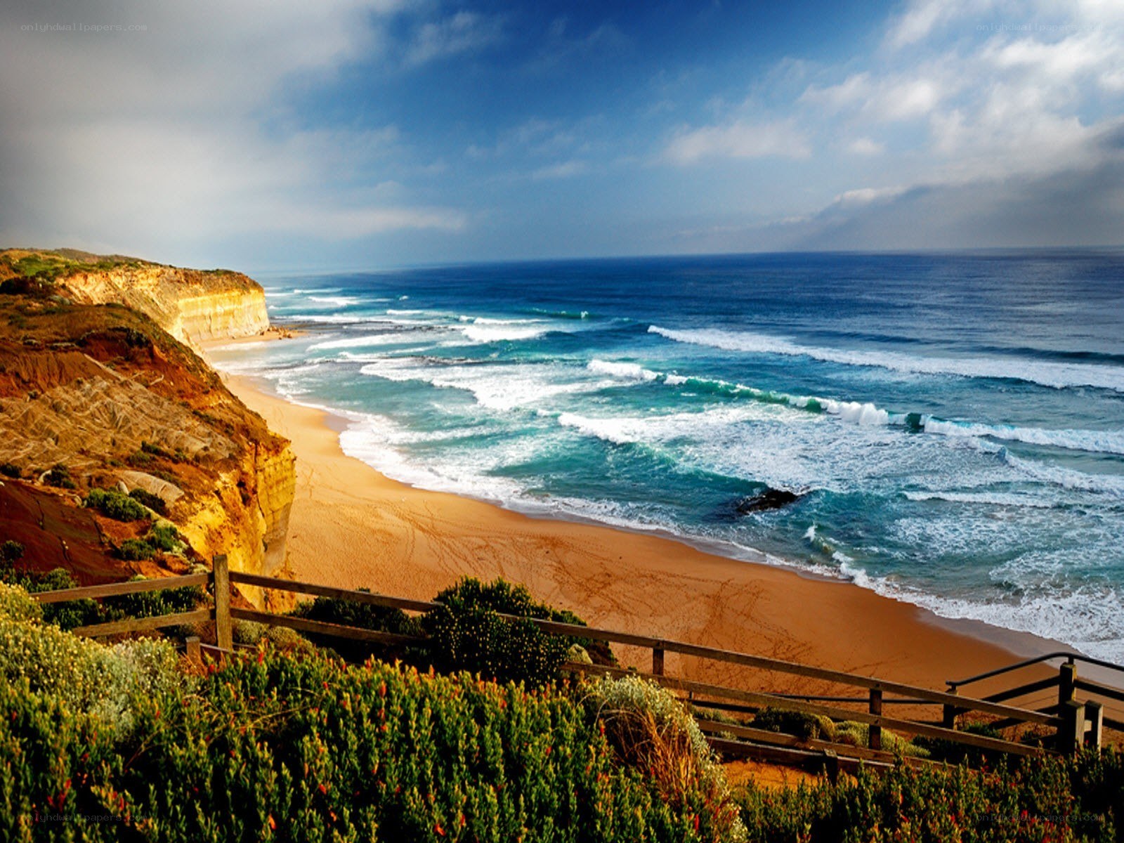 cliffside beach with ocean waves
