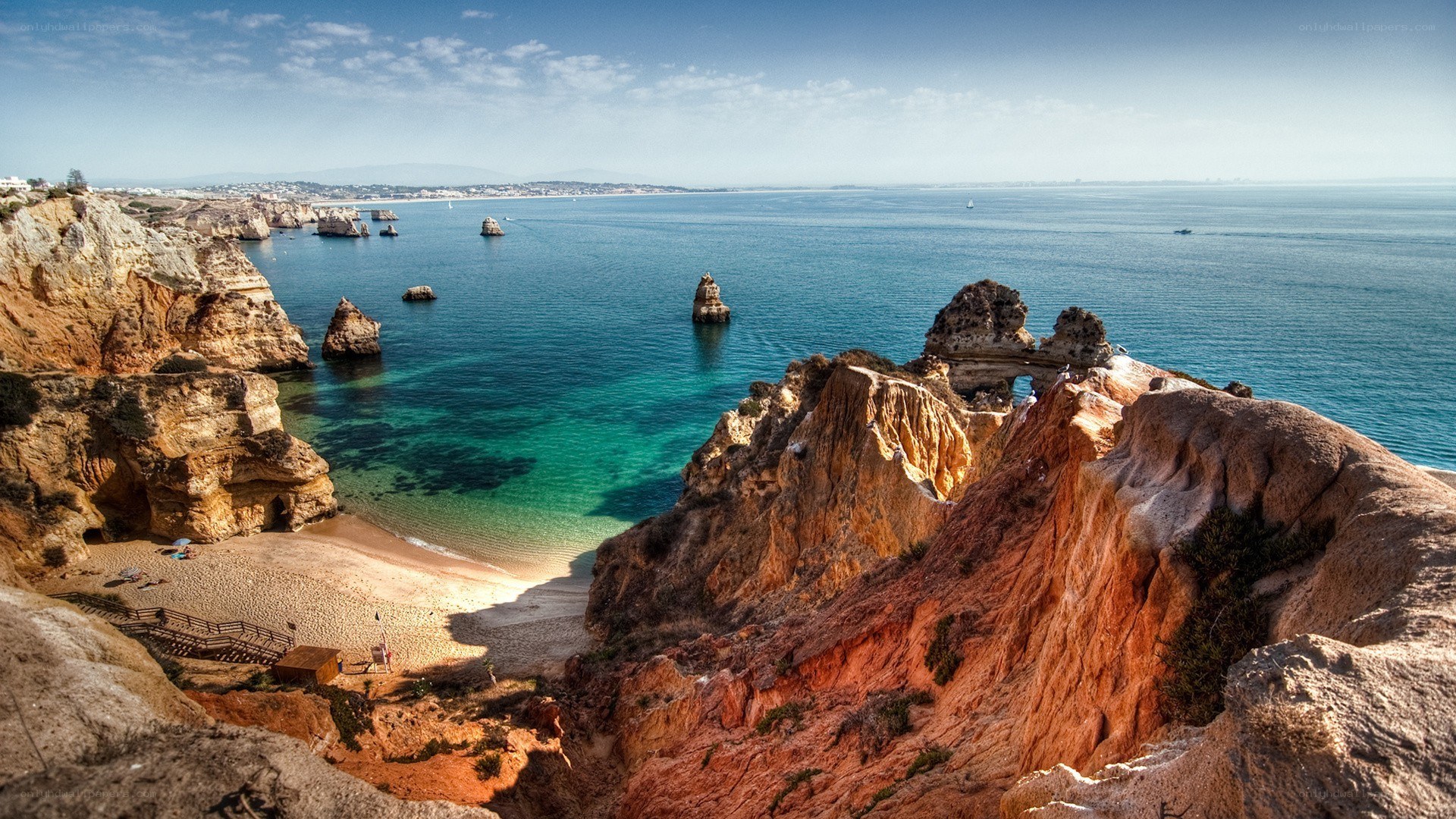 cliffside beach with sea stacks