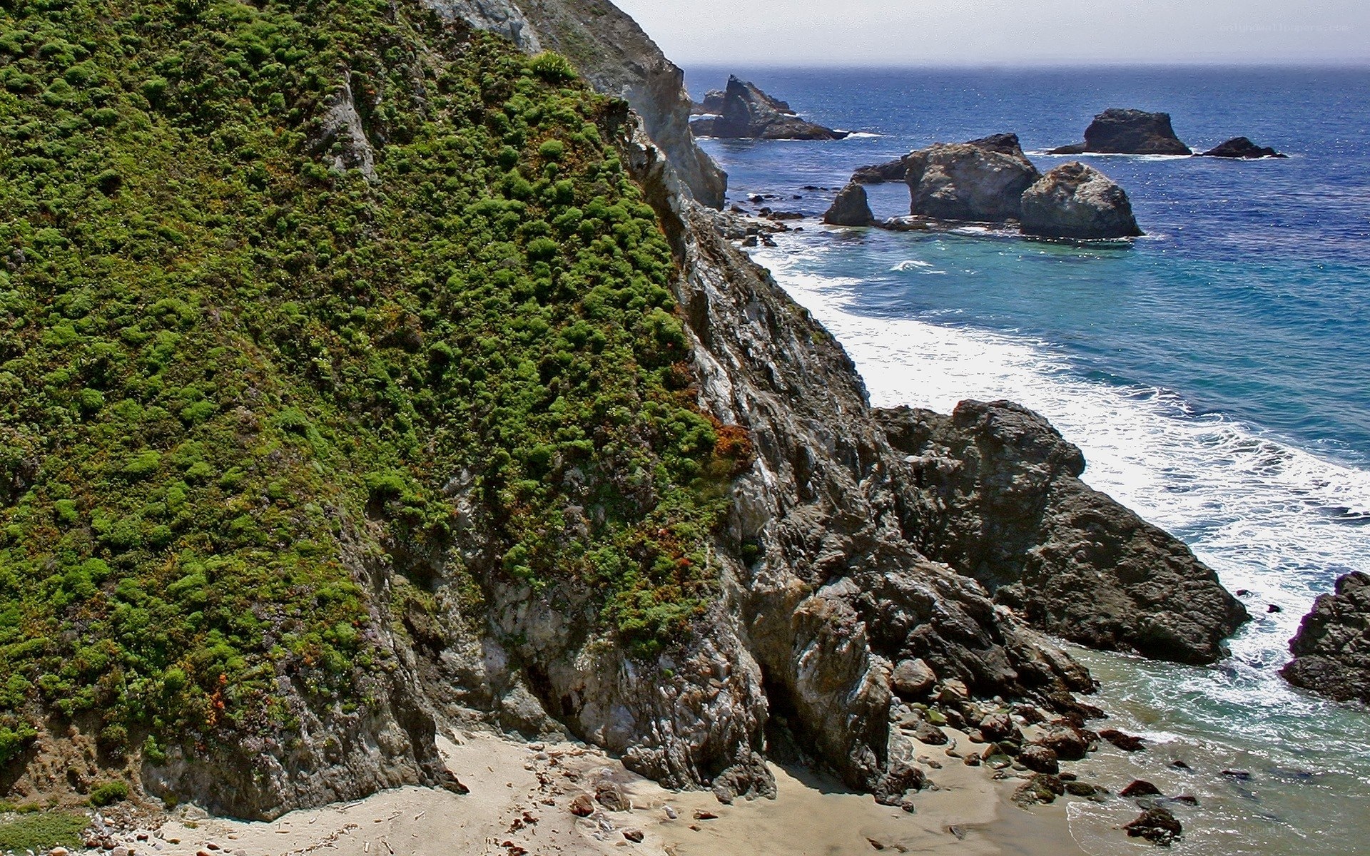 cliffside beach with sea stacks