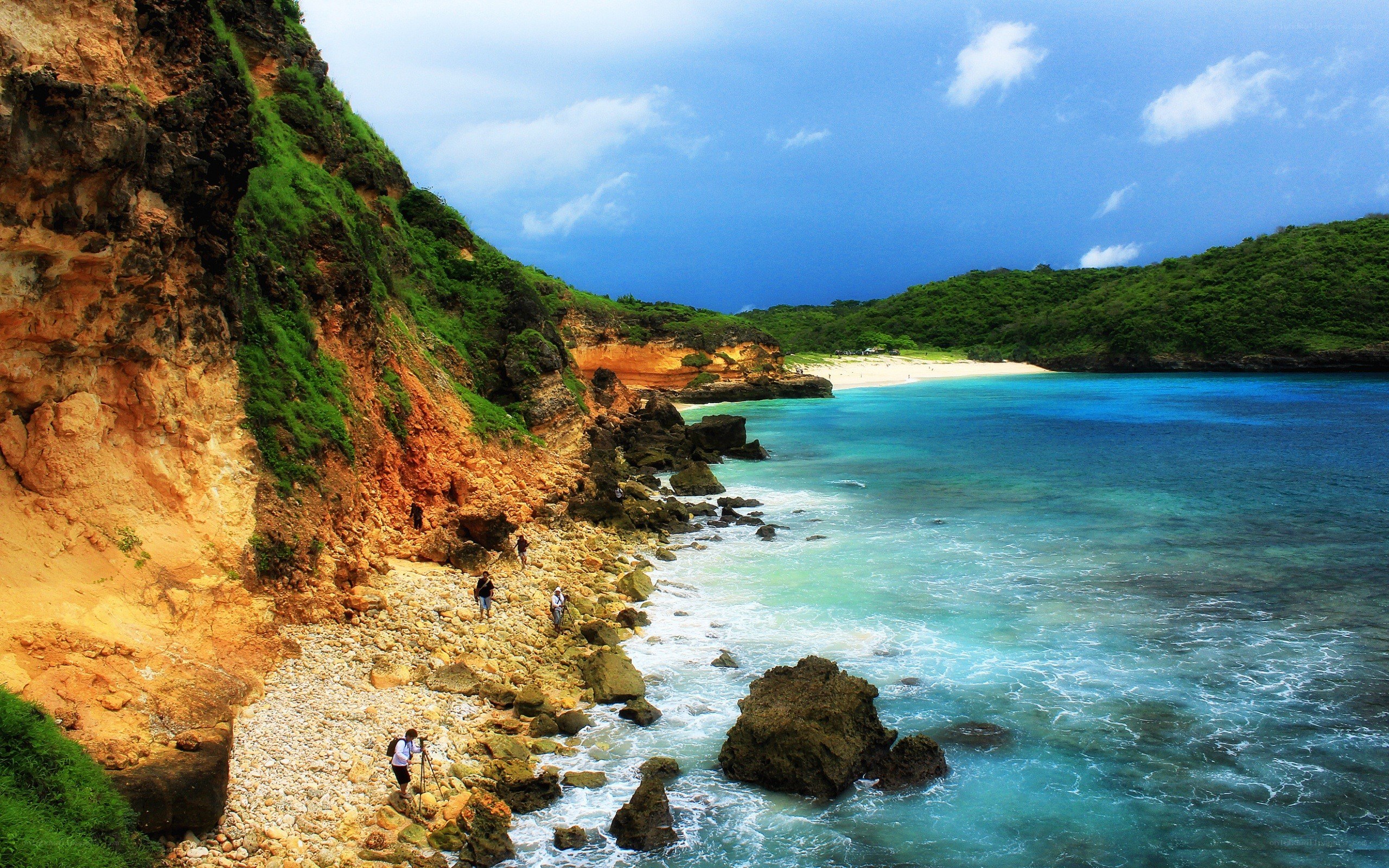 cliffside beach with turquoise water