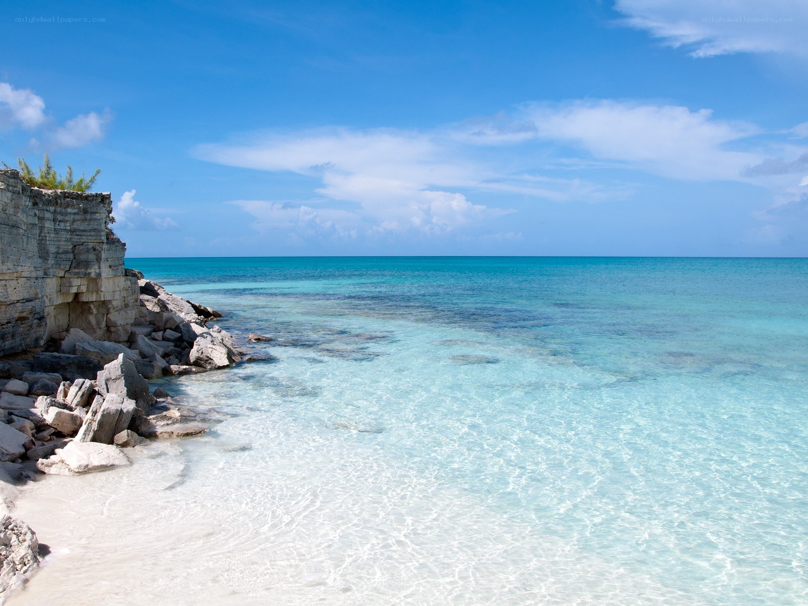 Cliffside beach with turquoise water