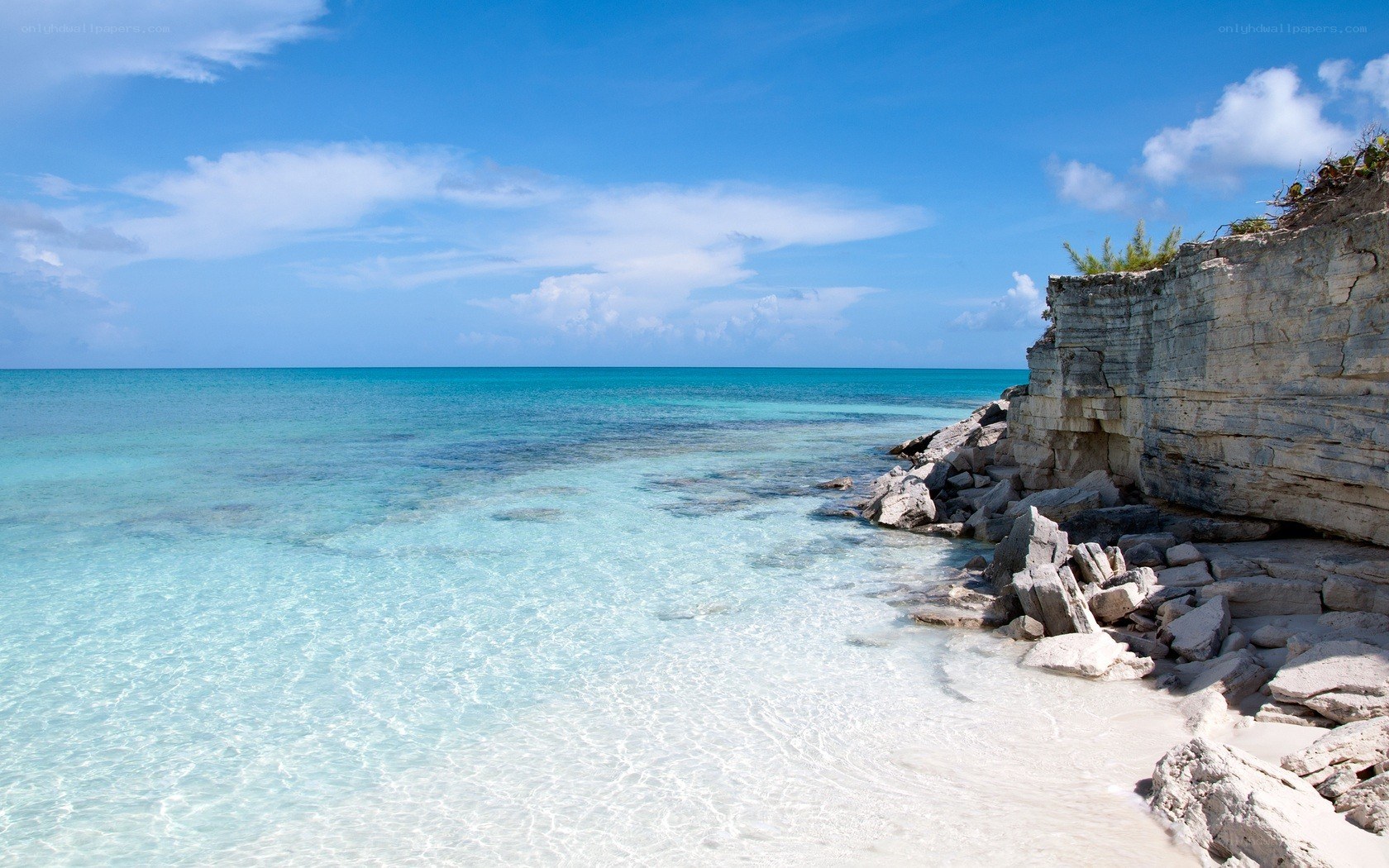 Cliffside beach with turquoise water