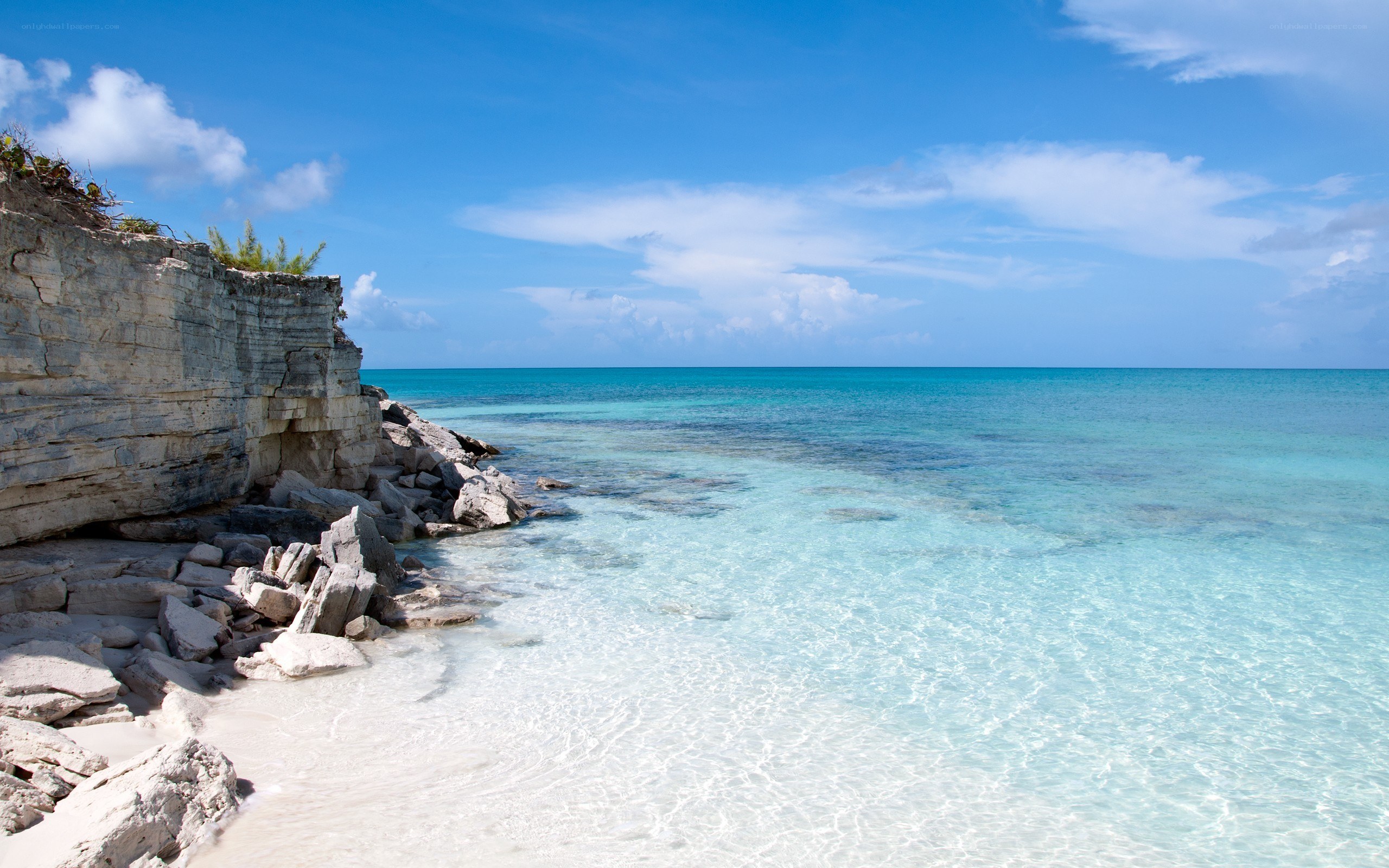 Cliffside beach with turquoise water