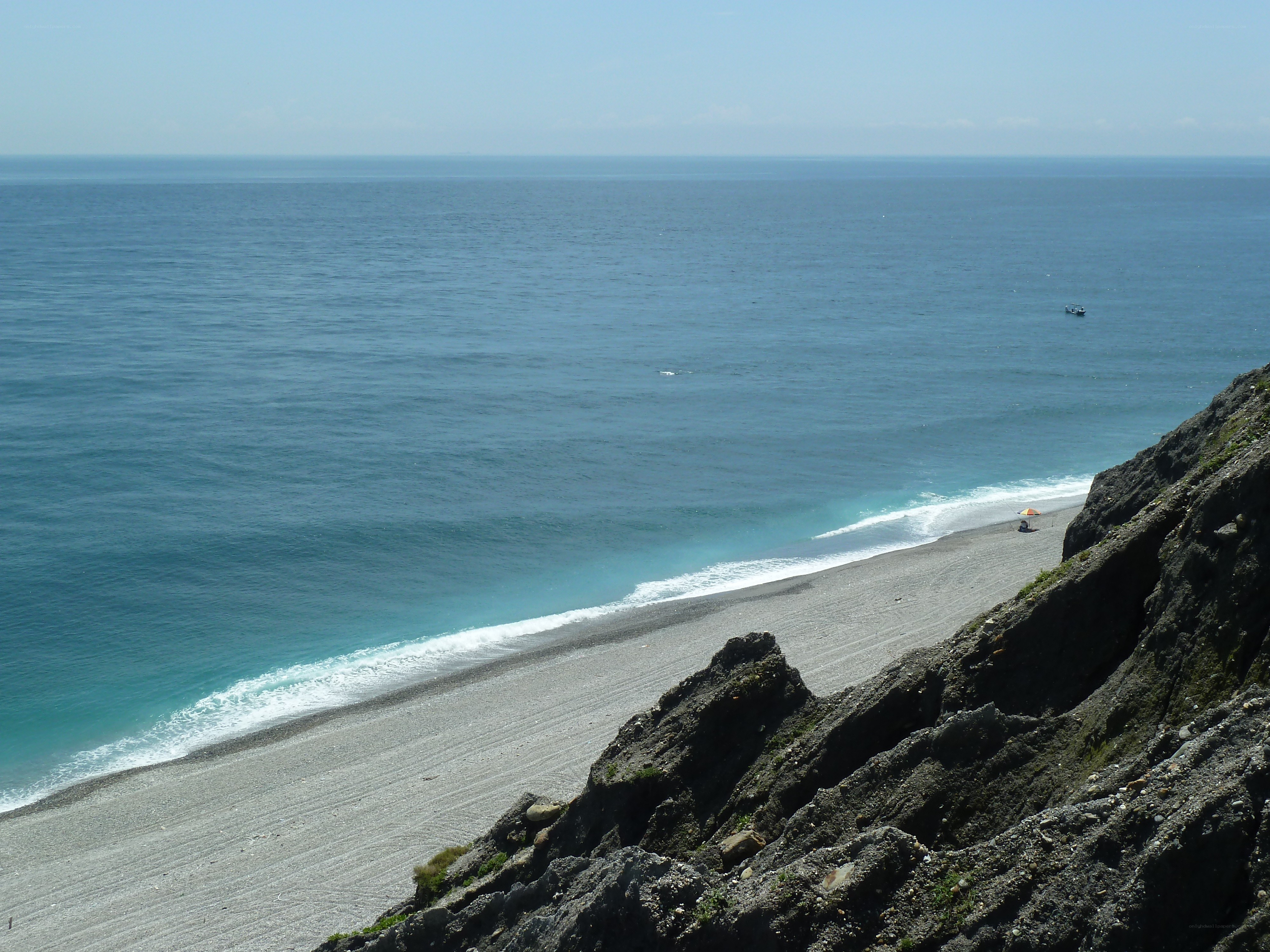Cliffside beach with turquoise water