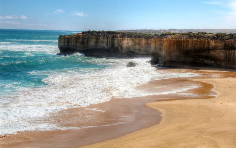 Cliffside Beach with Waves — Blue, Serene, Afternoon, Photograph, Ocean