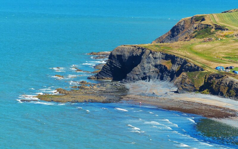 Cliffside Beach with Waves — Blue, Serene, Afternoon, Photograph