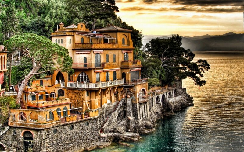 Cliffside Building by Sea — Orange