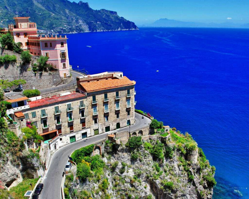 Cliffside Buildings by Sea