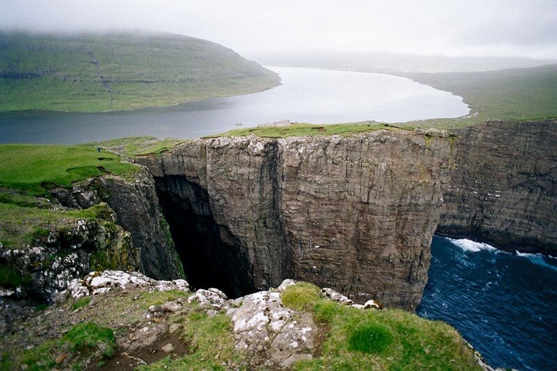 cliffside cave overlooking a fjord