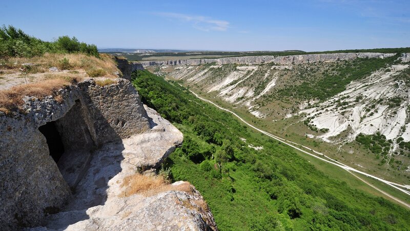 cliffside cave overlooking a valley