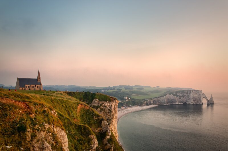 Cliffside church at sunset