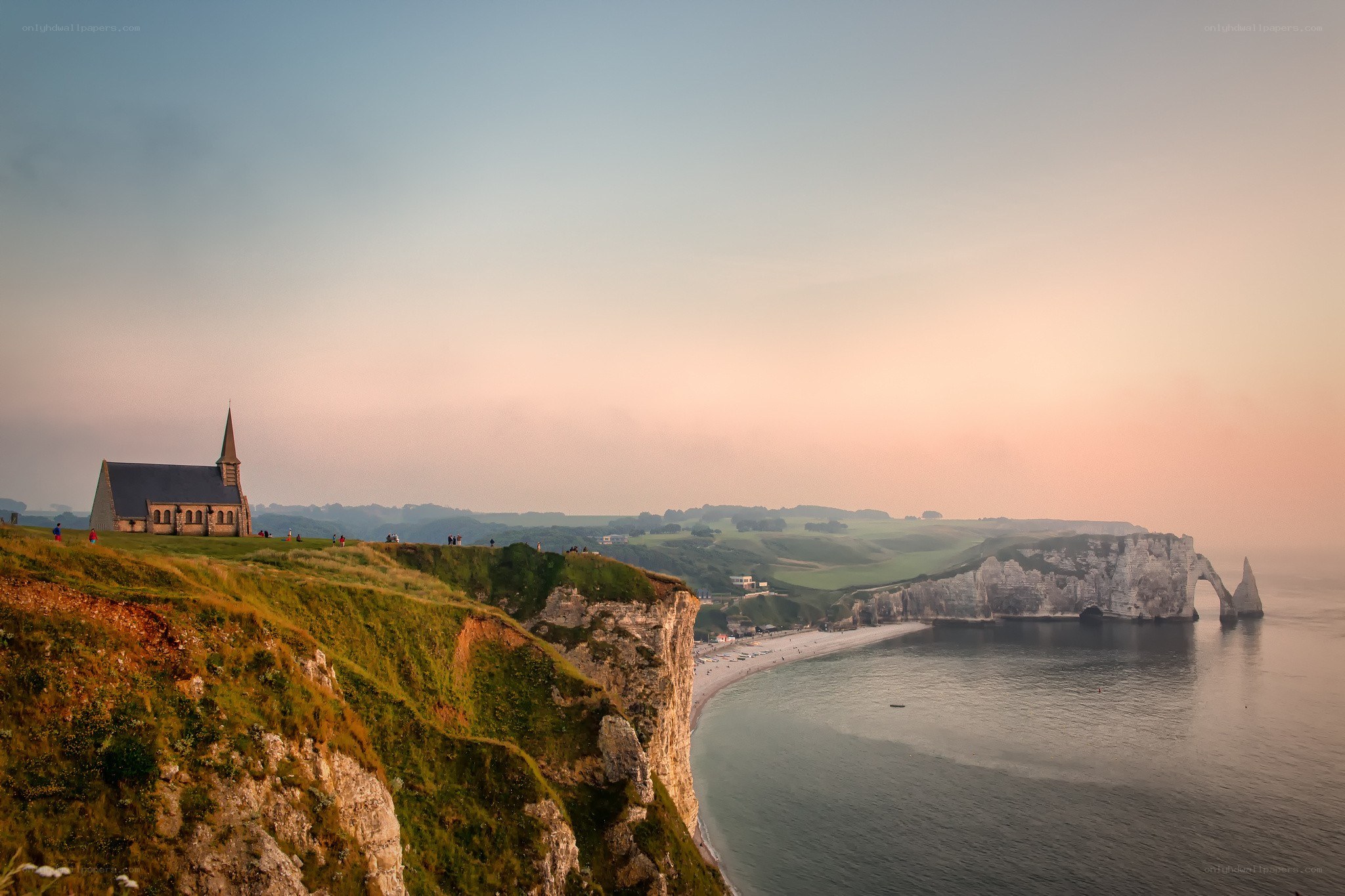 Cliffside church at sunset