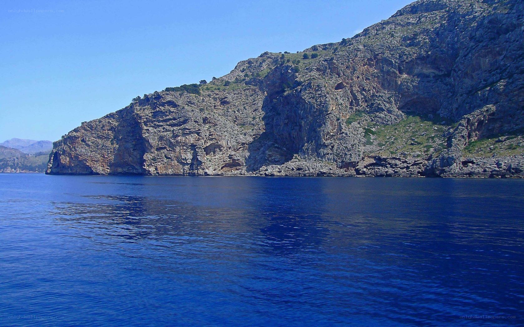 cliffside coast with blue sea