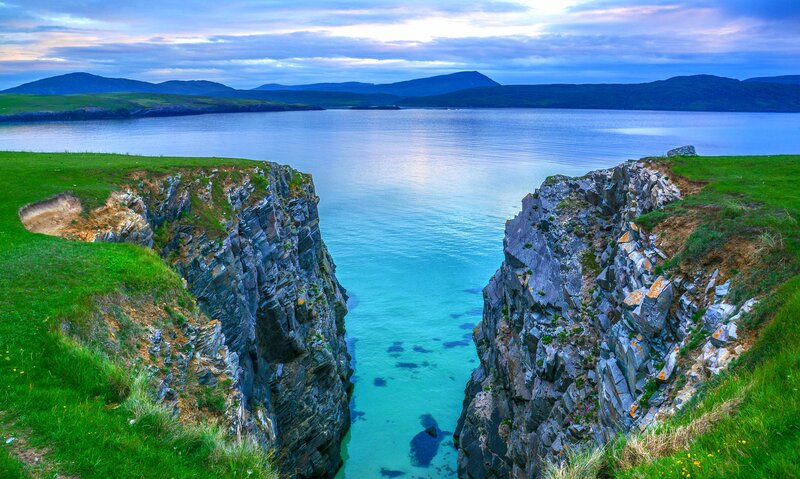 Cliffside Coastal Inlet — Blue