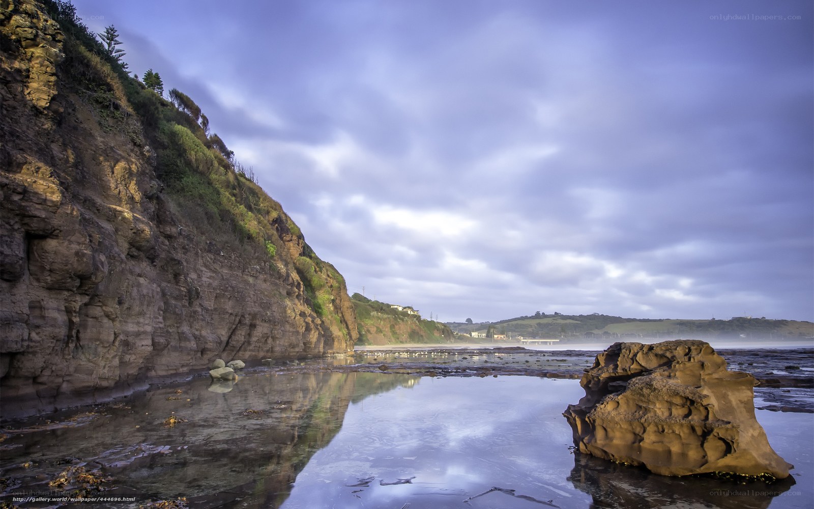 Cliffside coastal landscape at dusk