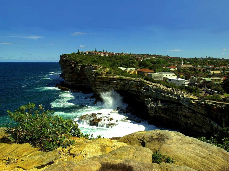 Cliffside Coastal Town — Blue, Dramatic