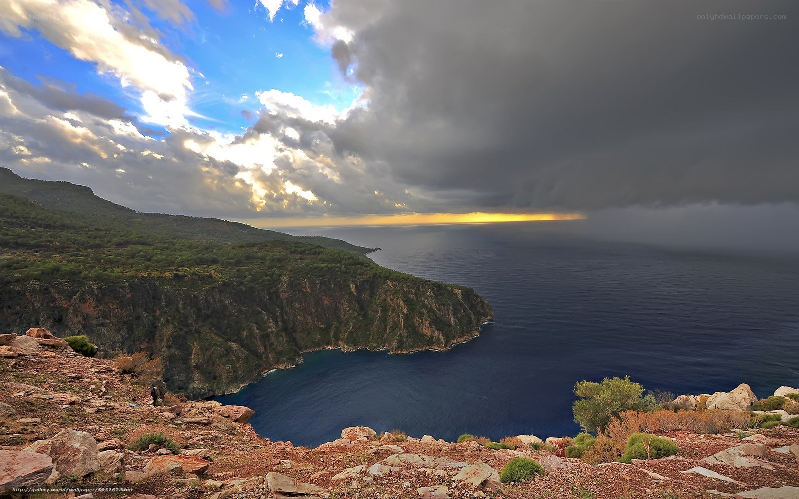 Cliffside coastal view at sunset