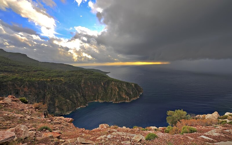 Cliffside coastal view at sunset