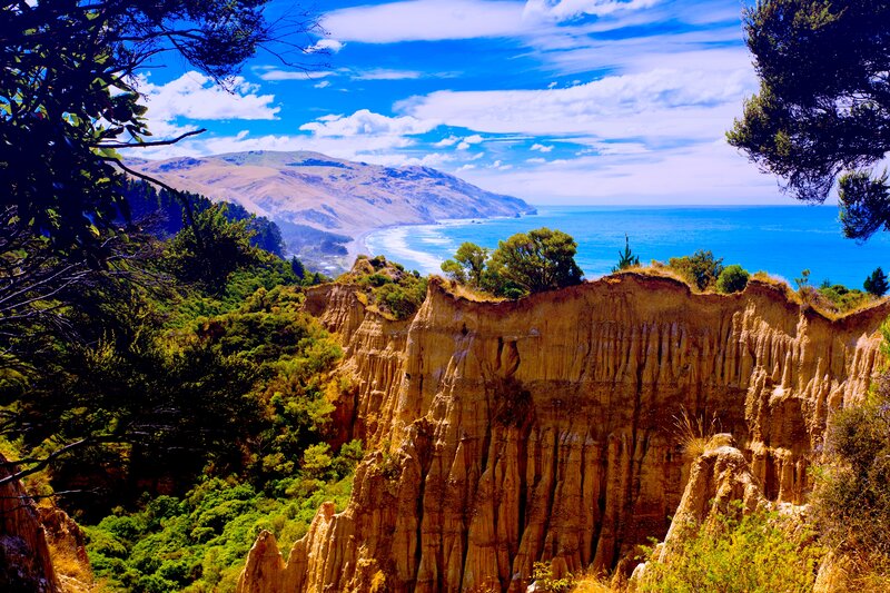 Cliffside Coastal View — Blue, Serene, Afternoon, Photograph