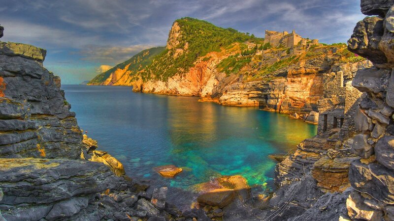 Cliffside Coastal Village — Blue, Dramatic, Sunset