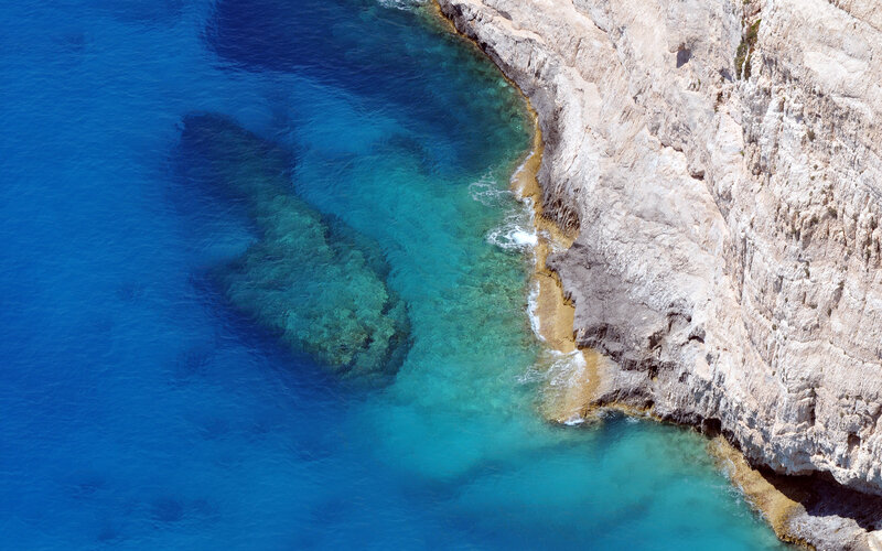Cliffside coastal waters