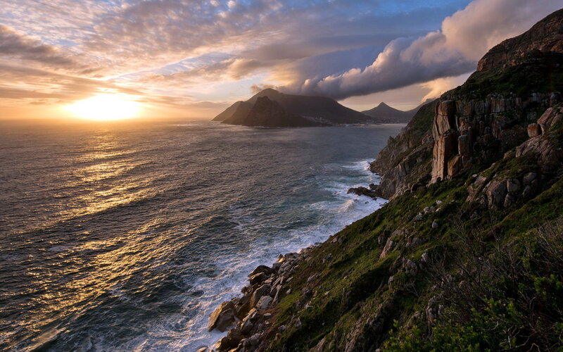 Cliffside Coastline at Sunset — Blue, Dramatic, Photograph