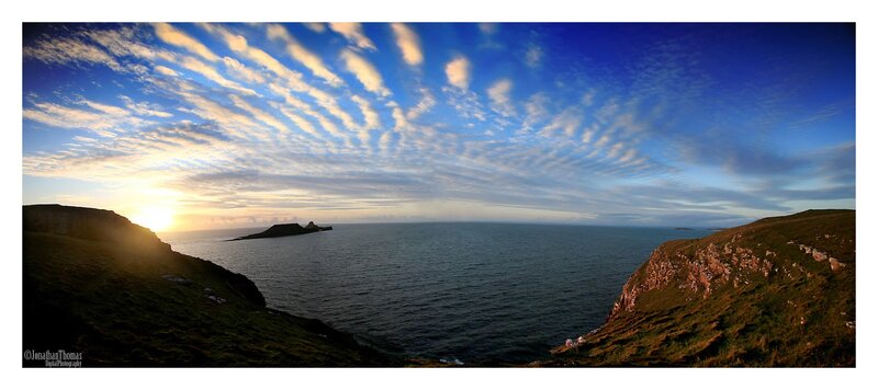Cliffside Coastline at Sunset — Blue, Serene, Photograph, Ocean