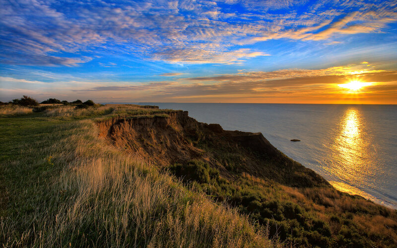 Cliffside Coastline at Sunset — Blue, Serene