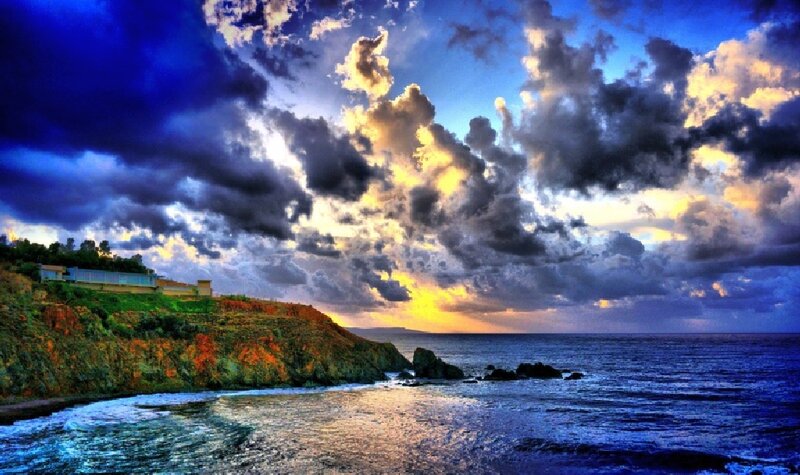 Cliffside Coastline at Sunset — Blue