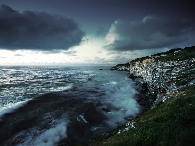 Cliffside Coastline — Blue, Dramatic, Night, Photograph