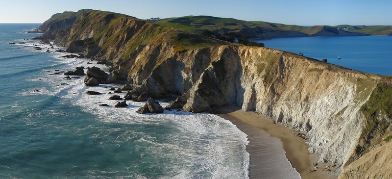 Cliffside Coastline — Blue, Serene, Afternoon, Photograph, Ocean, Beach, Hills