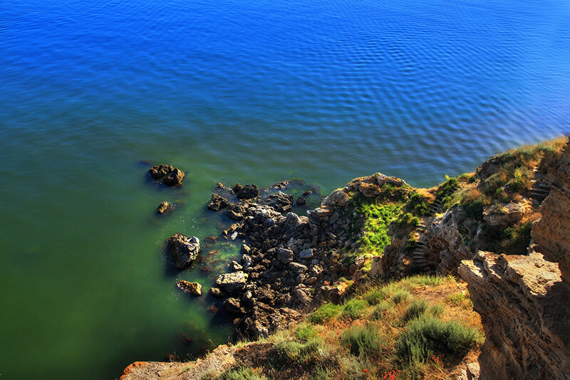 Cliffside Coastline — Blue, Serene, Afternoon, Photograph, Rocks
