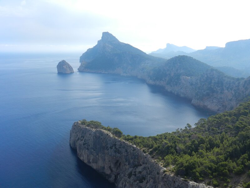 Cliffside Coastline — Blue, Serene, Afternoon, Photograph, Sea, Mountain