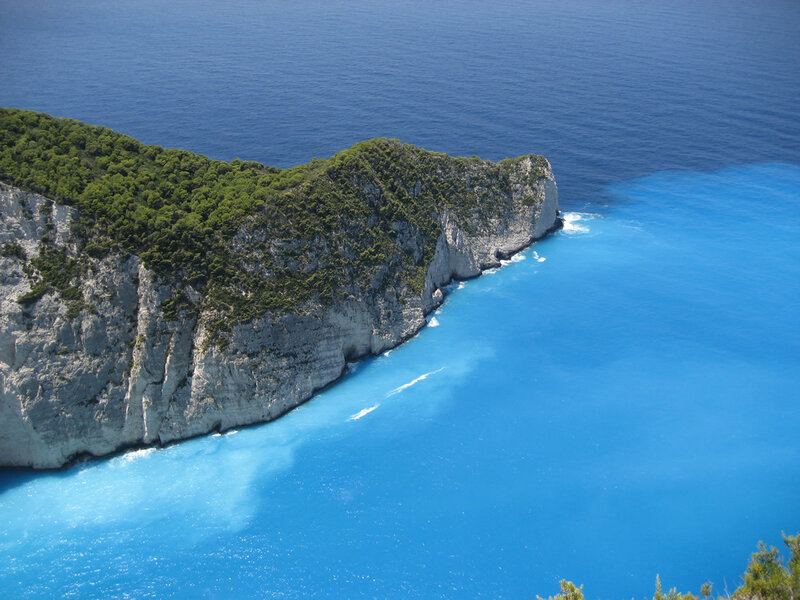 Cliffside Coastline — Blue, Serene, Daytime