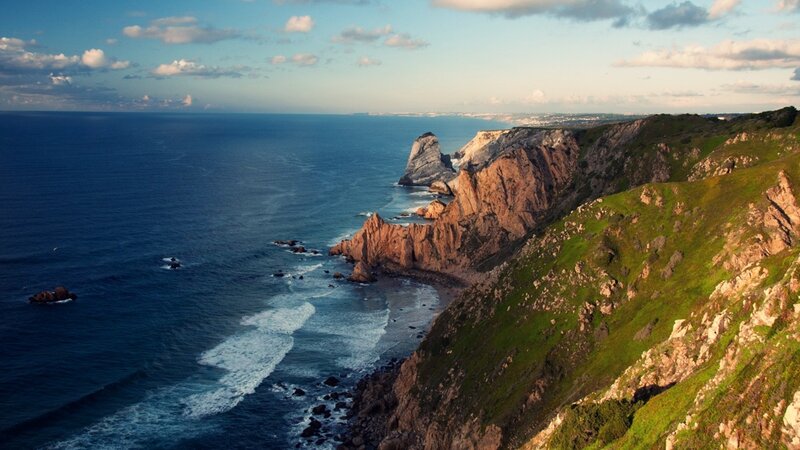 Cliffside Coastline — Blue, Serene, Sunset, Photograph, Ocean, Rocks