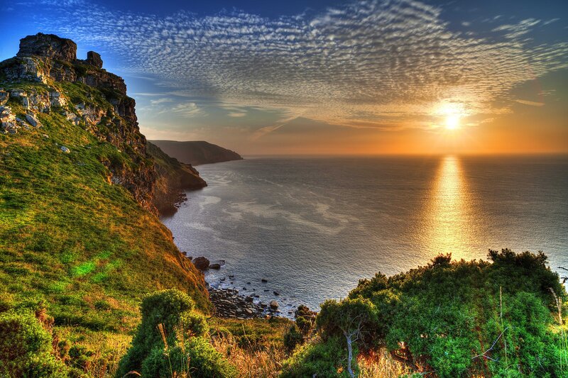 Cliffside Coastline — Blue, Serene, Sunset, Photograph, Ocean