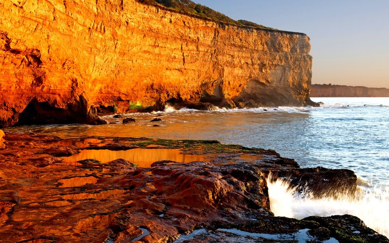 Cliffside Coastline — Orange