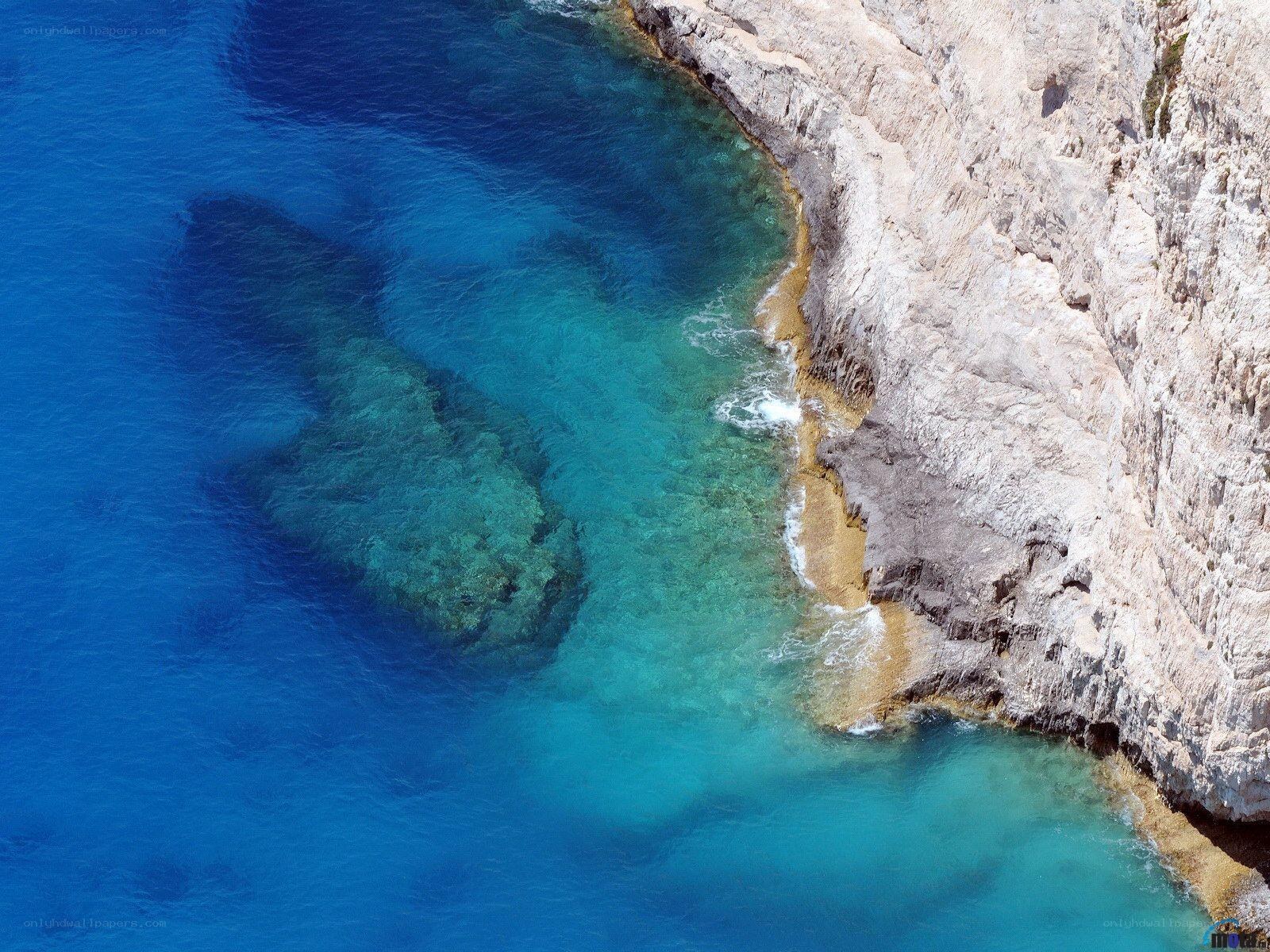 cliffside coastline with turquoise water