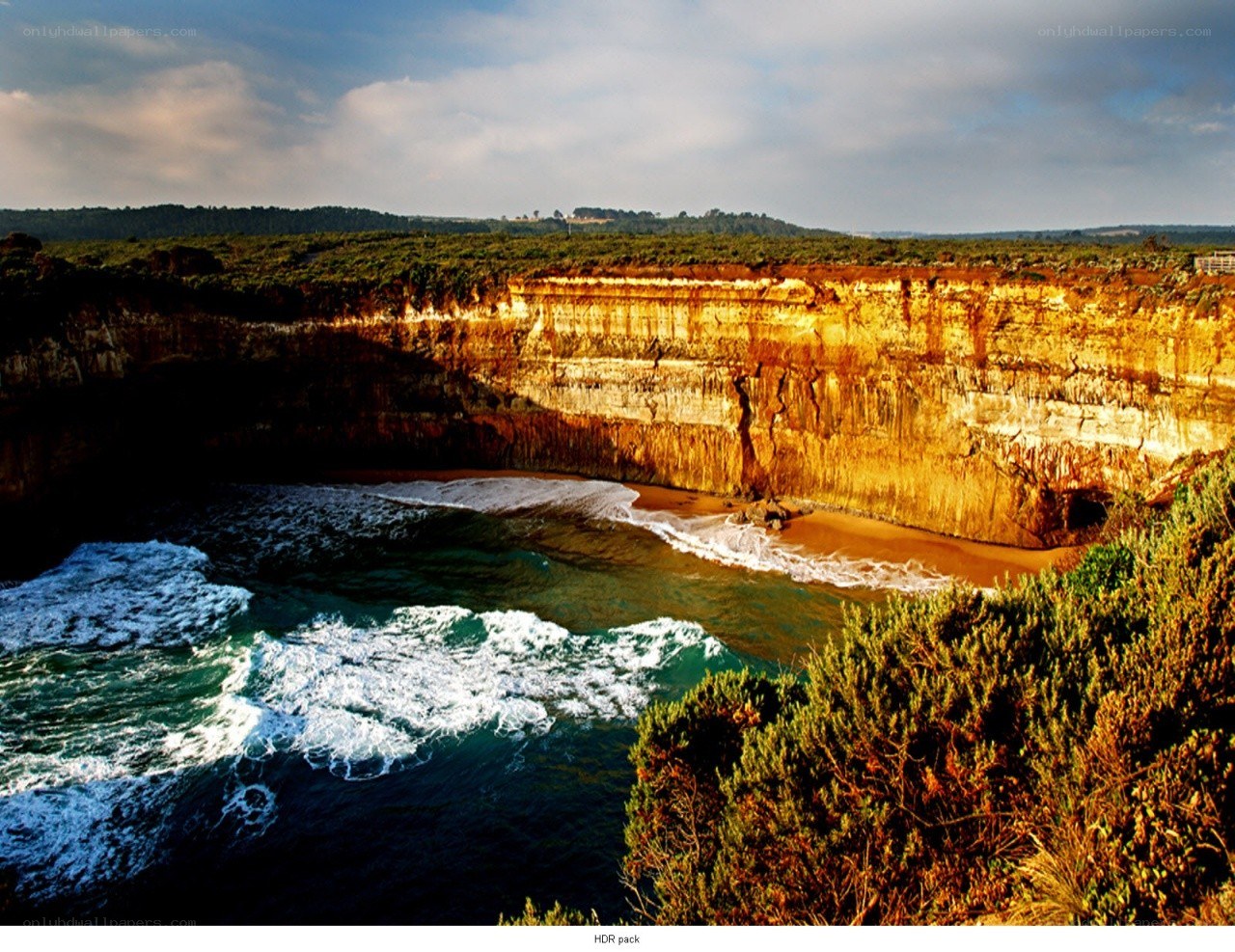 cliffside cove at sunset
