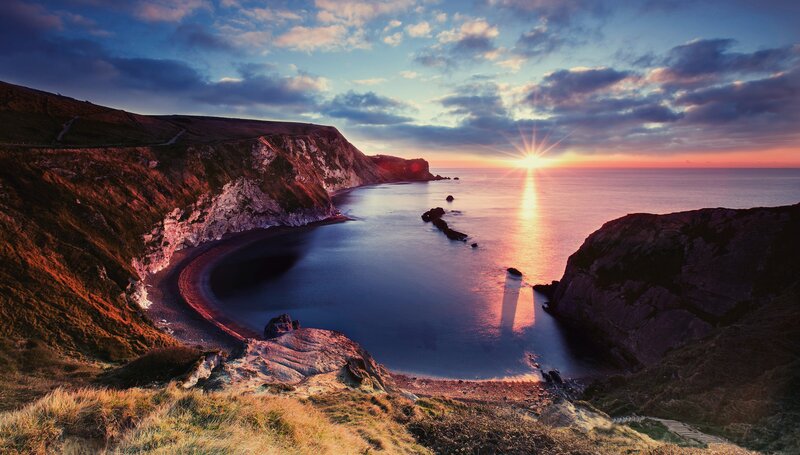 Cliffside Cove at Sunset — Blue, Dramatic, Photograph, Sun