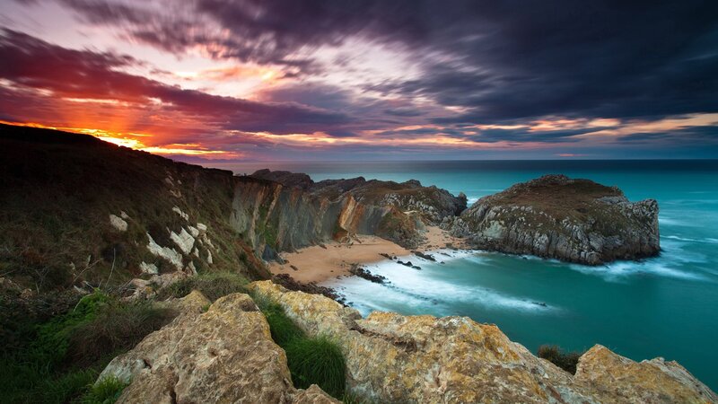 Cliffside Cove at Sunset — Orange, Dramatic, Photograph