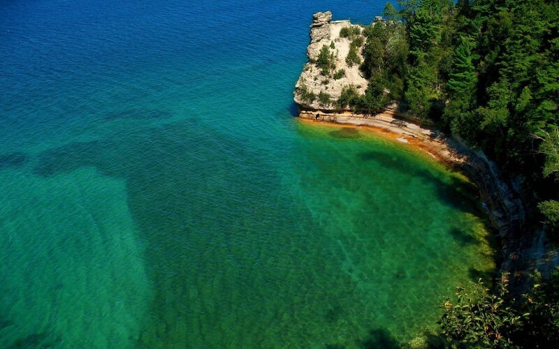 Cliffside Cove with Clear Water — Blue