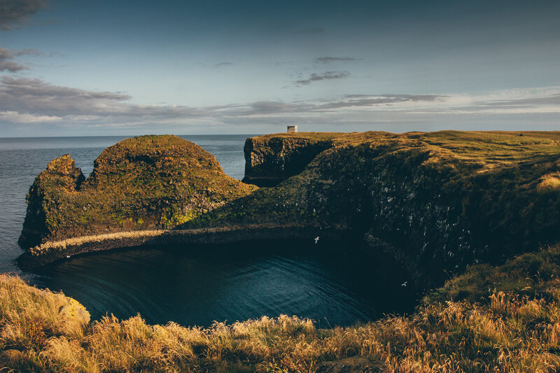 Cliffside Cove with Lighthouse