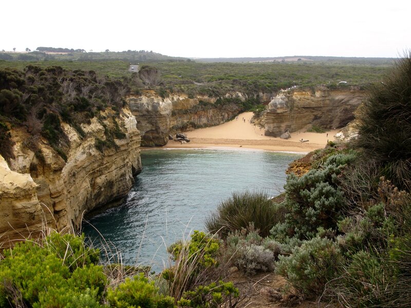 cliffside cove with sandy beach
