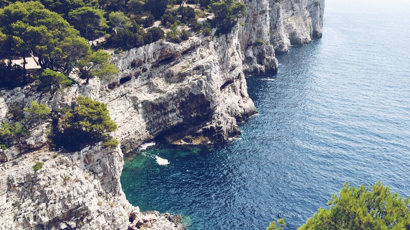 Cliffside Cove with Sea — Blue, Serene, Afternoon