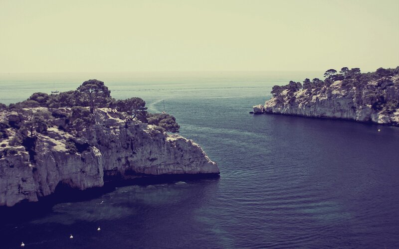 Cliffside Cove with Sea — Blue