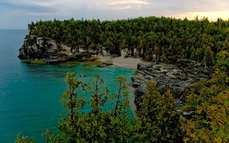 cliffside cove with turquoise water