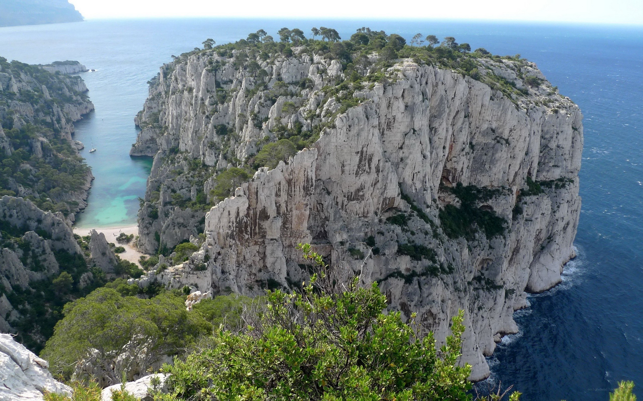 cliffside cove with turquoise water