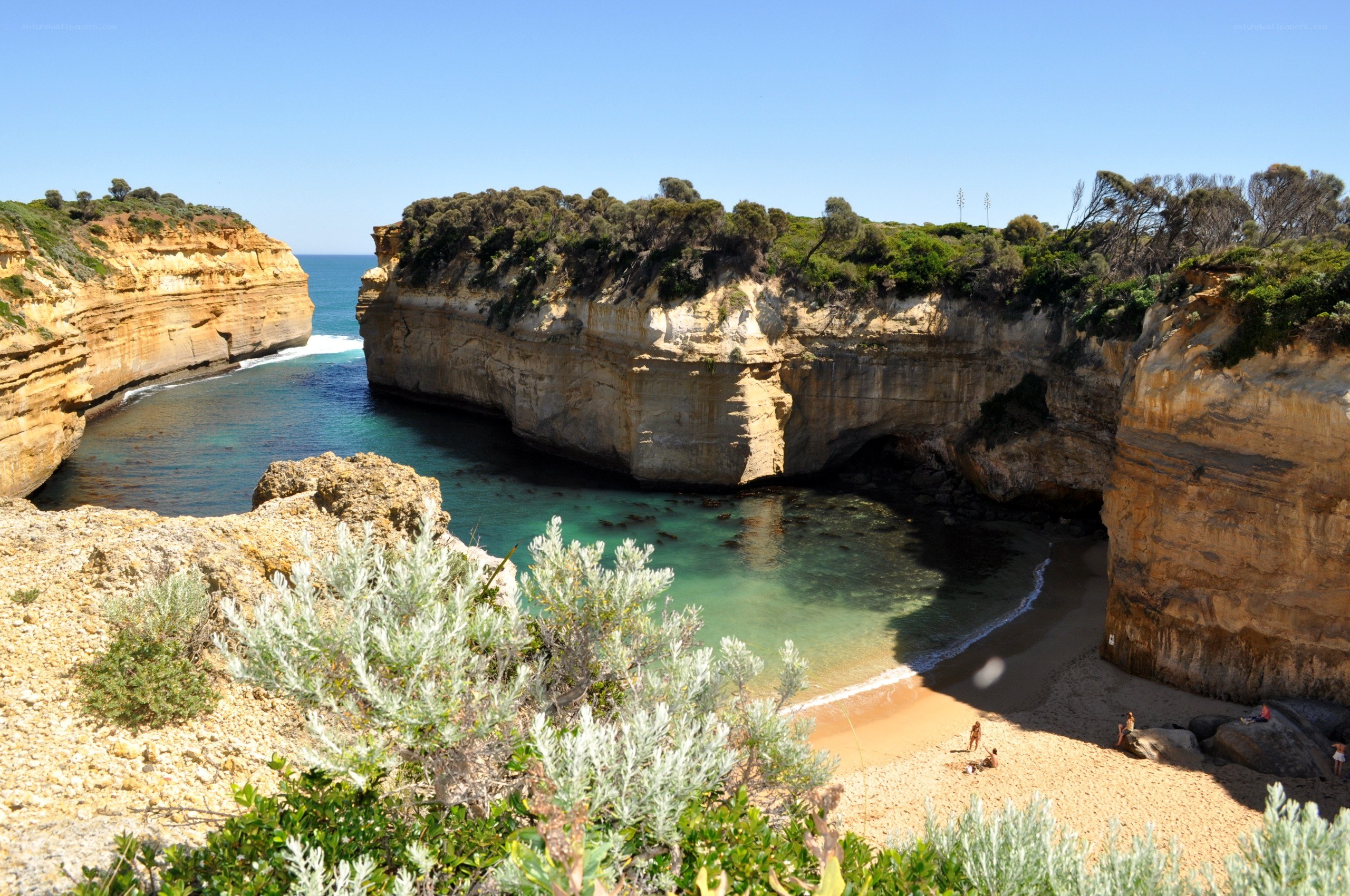 cliffside cove with turquoise water
