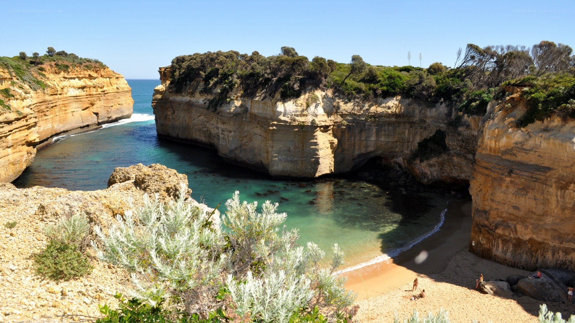 cliffside cove with turquoise water